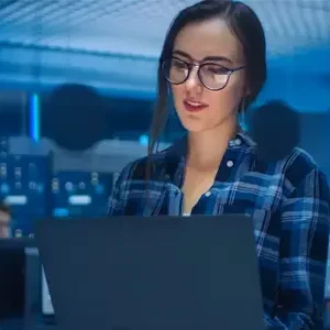 female IT working on computer