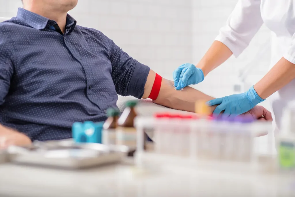 patient getting ready to have blood drawn