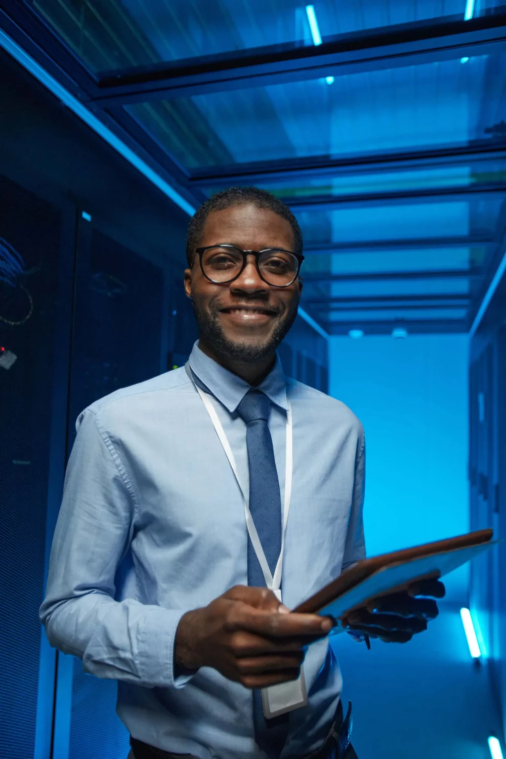 image of IT professional in a server room